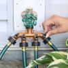imageMelnor 65077AMZ 4 Way Heavy Duty Metal Garden Hose Splitter Hose Spigot Adapter with 5 LeakFree Washers Brass Hose Bib Splitter