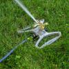 imageMelnor 65152AMZ Plastic Pulsating Sprinkler on Metal Spike Quick Connect Amazon Bundle Black GreenXT on Sled