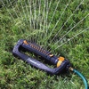 image:imageMelnor 65202AMZ CrossStream Turbo Oscillating Sprinkler 4000 Sq Ft Coverage TwinTouch Width amp Range Control InfinityDrive Turbo Motor Black OrangeCrossStream